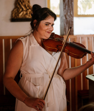 Lady playing string music instrument